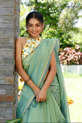 Plain Chanderi Plain Fancy Green saree in white background, close up